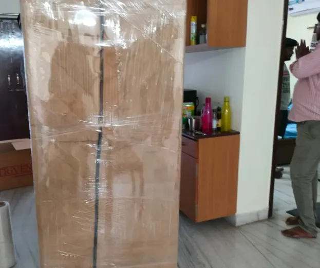 Professional team handling a home relocation