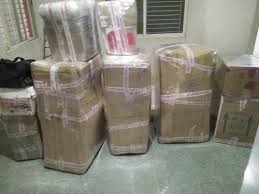 Goods wrapped with protective packing material